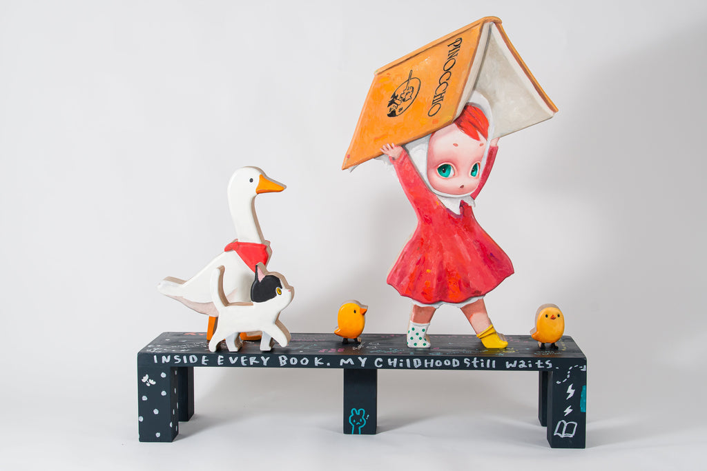 Carrying a Tale, MANE, 2025Painted wood sculpture120.0 × 30.0 × 115.0 cm